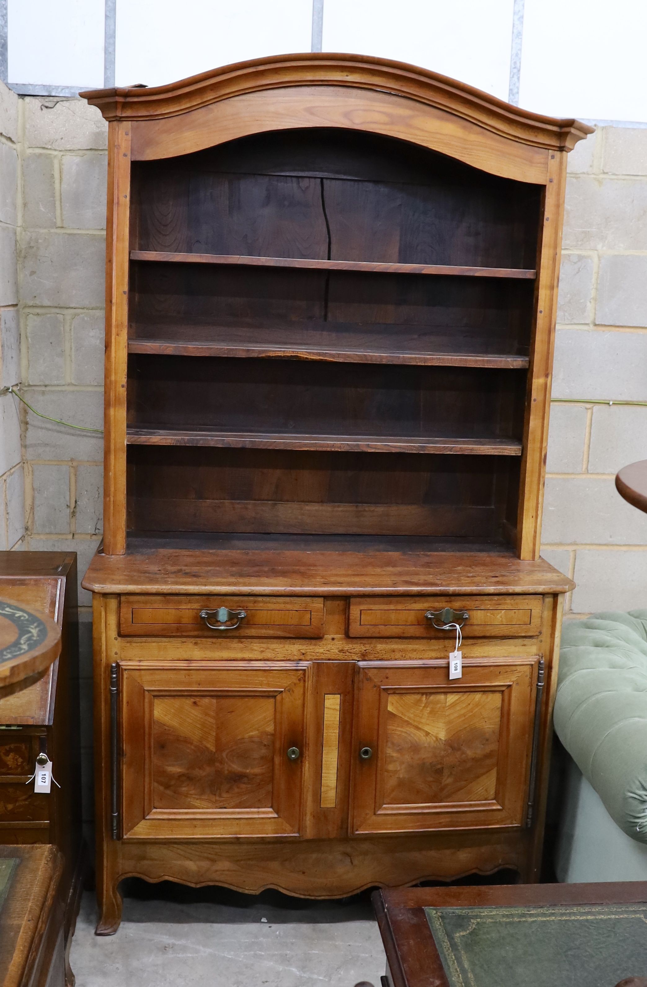 An 18th century French cherry dresser, length 126cm, depth 58cm, height 230cm